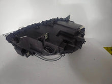Load image into Gallery viewer, This image features the left-side Xenon headlight for the BMW 7 Series F01/F02 models, showcasing used OEM genuine quality with part number 7225229. Designed specifically for the F01 and F02 chassis, this original headlamp offers high-intensity Xenon lighting and precise fitment for the left side, ensuring reliable performance and compatibility.