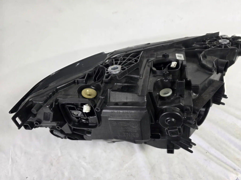 Used genuine BMW LED headlight for 4 Series models including G22, G23, G26, G80, G82, and G83. This left-side OEM headlamp, part number 9851035, is designed to perfectly fit and function in compatible BMW vehicles. The image shows the original BMW LED headlight in used condition with visible connectors, housing, and lens – ideal for replacement or repair of your vehicle’s front lighting system.