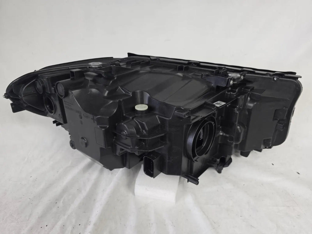 This image shows the left-side LED headlight for the BMW 5 Series G30 and G31 models, featuring OEM genuine quality with part number 7439199. This used original headlamp is engineered for a precise fit on the left side, offering bright and efficient LED illumination, modern styling, and the reliable performance expected from BMW components.