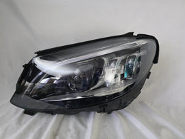 This image features the left-side Multibeam LED headlight for the Mercedes-Benz C-Class W205 Facelift (FL) model, with OEM genuine quality and part number A2059061506. This used original headlamp is designed for a perfect fit on the facelifted W205, delivering advanced Multibeam LED technology for precise, adaptive lighting and optimal driving visibility