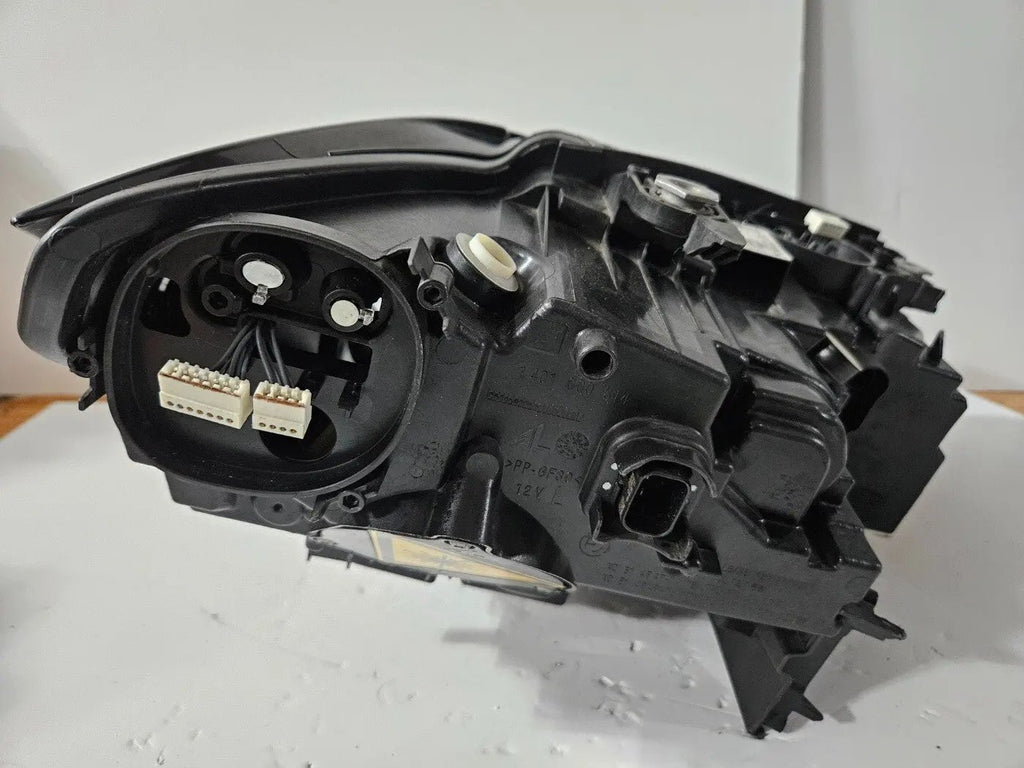 Genuine used BMW Laser headlight for 3 Series models G20 and G21. This left-side OEM headlamp, part number 9481707, features high-performance laser lighting technology for superior road visibility and driving precision. The image showcases the original left laser headlight in used condition, clearly showing the lens structure, housing, and connector ports — ideal for replacing a damaged headlamp on compatible BMW 3 Series vehicles.

