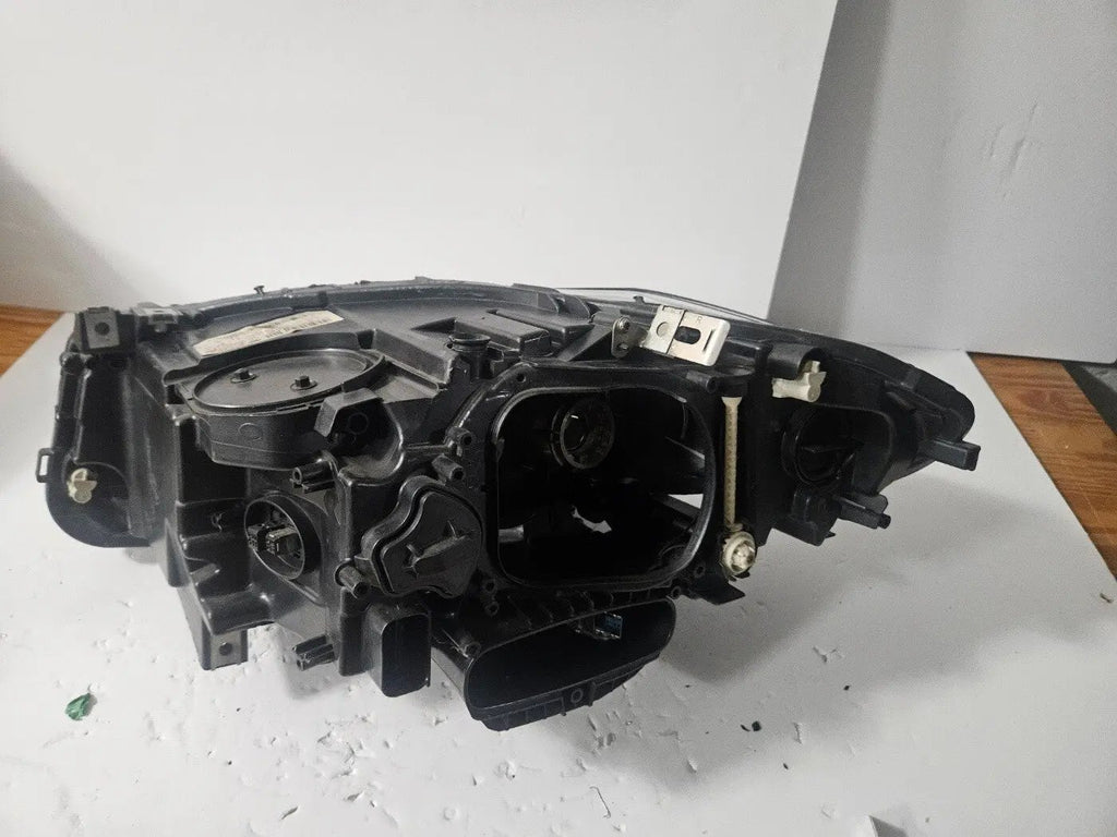 This image displays the right-side Xenon headlight for the BMW 5 Series F18 LCI, F10 LCI, and F11 LCI models, featuring OEM genuine quality with part number 7343912. This used original headlamp is designed specifically for the facelifted (LCI) versions, offering precise fitment, powerful Xenon illumination, and the premium durability expected from authentic BMW components.