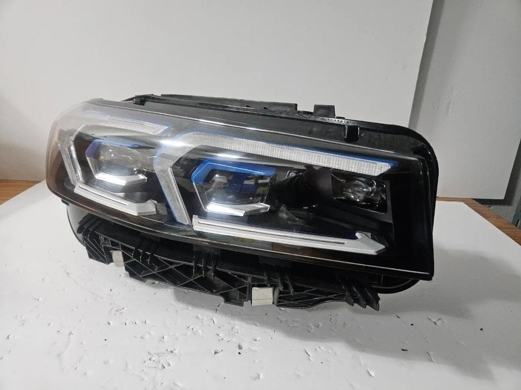 This image features the right-side Adaptive LED headlight for the BMW 3 Series G20 LCI and G21 LCI models, with OEM genuine quality and part number 5A1A354. This used original headlamp is designed for the facelifted versions, offering precise fitment, dynamic beam control, and advanced Adaptive LED technology to enhance visibility and maintain the sleek, modern appearance of the 3 Series.