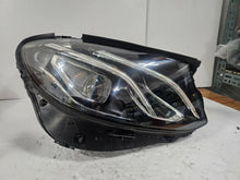 Load image into Gallery viewer, This image features the right-side LED High Performance headlight for the Mercedes-Benz E-Class W213, showcasing OEM genuine quality with part number A2139064004. Specifically designed for the W213 model, this used headlight offers high-performance LED illumination and is an original Mercedes-Benz component, ensuring precise fit and reliable functionality