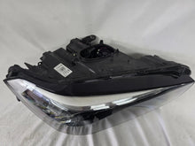Load image into Gallery viewer, Used genuine BMW Adaptive LED headlight for X1 F48 LCI (facelift) model. This right-side OEM headlamp, part number 5A01178, is equipped with adaptive lighting technology for improved night visibility and cornering performance. The image displays the original right Adaptive LED headlight in used condition, showing the clear lens, mounting brackets, and electrical connectors — an ideal OEM replacement for BMW X1 F48 LCI vehicles.

