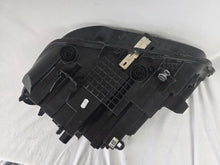Load image into Gallery viewer, Used genuine BMW Adaptive LED headlight for X1 F48 LCI (facelift) model. This right-side OEM headlamp, part number 5A01178, is equipped with adaptive lighting technology for improved night visibility and cornering performance. The image displays the original right Adaptive LED headlight in used condition, showing the clear lens, mounting brackets, and electrical connectors — an ideal OEM replacement for BMW X1 F48 LCI vehicles.


