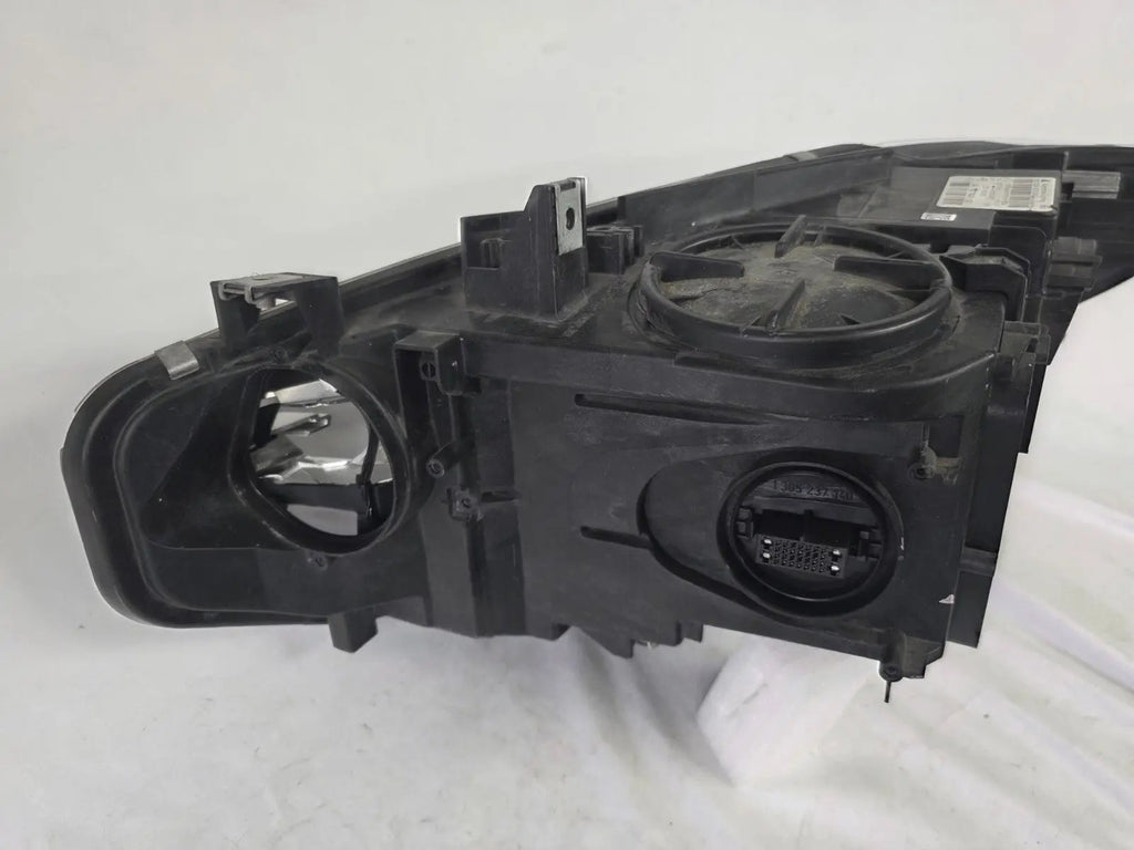 Genuine used BMW Adaptive LED headlight for 4 Series models F32, F33, F36, F80 LCI, F82, and F83. This right-side OEM headlamp, part number 7377842, is designed with adaptive lighting technology for improved visibility and performance. The image highlights the complete original headlight unit in used condition, including the clear lens, mounting points, and electrical connectors — ideal for replacement on compatible BMW models.