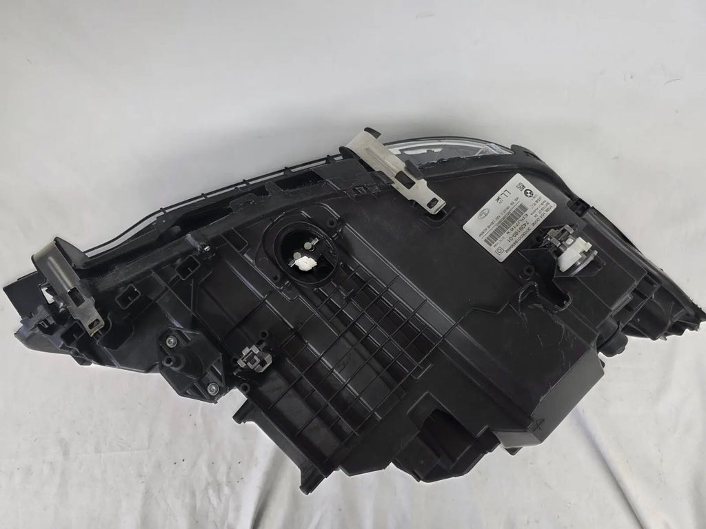 This image shows the left-side LED headlight for the BMW 5 Series G30 and G31 models, featuring OEM genuine quality with part number 7439199. This used original headlamp is engineered for a precise fit on the left side, offering bright and efficient LED illumination, modern styling, and the reliable performance expected from BMW components.