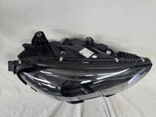 Load image into Gallery viewer, This image showcases the OEM genuine DIGITAL LIGHT headlights for the Mercedes-Benz E-Class W214, available for both right and left sides with part numbers A2149066102 (right) and A2149066202 (left). These advanced headlamps are original Mercedes-Benz components designed for the W214 model, offering cutting-edge DIGITAL LIGHT technology that enhances driving safety and precision lighting. The headlights are used but maintain high-quality OEM standards and are ideal replacements for the corresponding side.