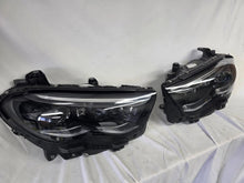 Load image into Gallery viewer, This image showcases the OEM genuine DIGITAL LIGHT headlights for the Mercedes-Benz E-Class W214, available for both right and left sides with part numbers A2149066102 (right) and A2149066202 (left). These advanced headlamps are original Mercedes-Benz components designed for the W214 model, offering cutting-edge DIGITAL LIGHT technology that enhances driving safety and precision lighting. The headlights are used but maintain high-quality OEM standards and are ideal replacements for the corresponding side.