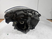 Load image into Gallery viewer, This image shows the left-side Xenon headlight for the Mercedes-Benz CLA Class C117, featuring original OEM quality with part number A1179065100. The headlight is a used but genuine component, designed to perfectly fit the left side of the CLA C117 model. It includes the factory-built Xenon lighting system and showcases the durable construction expected from Mercedes-Benz parts.