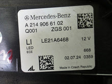 Load image into Gallery viewer, This image showcases the OEM genuine DIGITAL LIGHT headlights for the Mercedes-Benz E-Class W214, available for both right and left sides with part numbers A2149066102 (right) and A2149066202 (left). These advanced headlamps are original Mercedes-Benz components designed for the W214 model, offering cutting-edge DIGITAL LIGHT technology that enhances driving safety and precision lighting. The headlights are used but maintain high-quality OEM standards and are ideal replacements for the corresponding side.