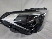 Load image into Gallery viewer, Used genuine BMW Adaptive LED headlight for X1 F48 LCI (facelift) model. This right-side OEM headlamp, part number 5A01178, is equipped with adaptive lighting technology for improved night visibility and cornering performance. The image displays the original right Adaptive LED headlight in used condition, showing the clear lens, mounting brackets, and electrical connectors — an ideal OEM replacement for BMW X1 F48 LCI vehicles.


