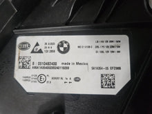Load image into Gallery viewer, This image features the right-side Adaptive LED headlight for the BMW 3 Series G20 LCI and G21 LCI models, with OEM genuine quality and part number 5A1A354. This used original headlamp is designed for the facelifted versions, offering precise fitment, dynamic beam control, and advanced Adaptive LED technology to enhance visibility and maintain the sleek, modern appearance of the 3 Series.