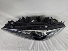 Load image into Gallery viewer, Used genuine BMW LED headlight for 4 Series models including G22, G23, G26, G80, G82, and G83. This left-side OEM headlamp, part number 9851035, is designed to perfectly fit and function in compatible BMW vehicles. The image shows the original BMW LED headlight in used condition with visible connectors, housing, and lens – ideal for replacement or repair of your vehicle’s front lighting system.

