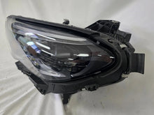 Load image into Gallery viewer, This image showcases the OEM genuine DIGITAL LIGHT headlights for the Mercedes-Benz E-Class W214, available for both right and left sides with part numbers A2149066102 (right) and A2149066202 (left). These advanced headlamps are original Mercedes-Benz components designed for the W214 model, offering cutting-edge DIGITAL LIGHT technology that enhances driving safety and precision lighting. The headlights are used but maintain high-quality OEM standards and are ideal replacements for the corresponding side.