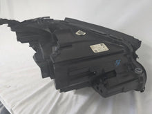Load image into Gallery viewer, This image displays the left-side Multibeam LED headlight with blue accents for the Mercedes-Benz E-Class W213, featuring OEM genuine quality and part number A2139066504. This original used headlamp is designed for precise fitment on the W213 model, offering advanced Multibeam LED technology with distinctive blue detailing for high-performance adaptive illumination and premium styling