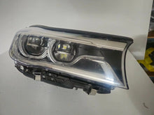 Load image into Gallery viewer, This image features the right-side Adaptive LED headlight (ICON design) for the BMW 7 Series G11 and G12 models, showcasing OEM genuine quality with part number 7408710. This used original headlamp offers BMW’s signature Adaptive LED with ICON styling, providing dynamic lighting performance, precise fitment, and premium functionality tailored for the luxury 7 Series lineup.