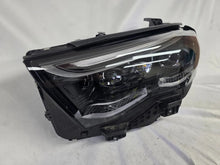 Load image into Gallery viewer, This image showcases the OEM genuine DIGITAL LIGHT headlights for the Mercedes-Benz E-Class W214, available for both right and left sides with part numbers A2149066102 (right) and A2149066202 (left). These advanced headlamps are original Mercedes-Benz components designed for the W214 model, offering cutting-edge DIGITAL LIGHT technology that enhances driving safety and precision lighting. The headlights are used but maintain high-quality OEM standards and are ideal replacements for the corresponding side.