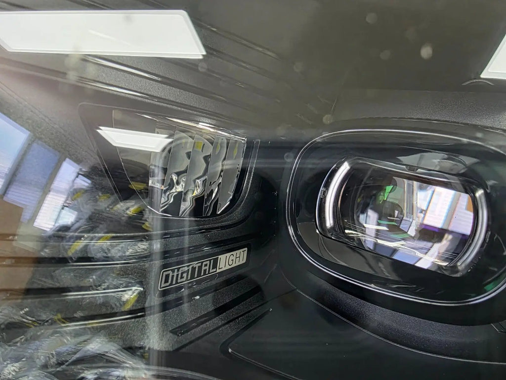 This image showcases the OEM genuine DIGITAL LIGHT headlights for the Mercedes-Benz E-Class W214, available for both right and left sides with part numbers A2149066102 (right) and A2149066202 (left). These advanced headlamps are original Mercedes-Benz components designed for the W214 model, offering cutting-edge DIGITAL LIGHT technology that enhances driving safety and precision lighting. The headlights are used but maintain high-quality OEM standards and are ideal replacements for the corresponding side.