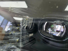 Load image into Gallery viewer, This image showcases the OEM genuine DIGITAL LIGHT headlights for the Mercedes-Benz E-Class W214, available for both right and left sides with part numbers A2149066102 (right) and A2149066202 (left). These advanced headlamps are original Mercedes-Benz components designed for the W214 model, offering cutting-edge DIGITAL LIGHT technology that enhances driving safety and precision lighting. The headlights are used but maintain high-quality OEM standards and are ideal replacements for the corresponding side.