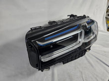 Load image into Gallery viewer, Genuine OEM BMW Laser headlight for 5 Series models G30, G31, and F90 LCI (facelift). This left-side headlamp, part number 5A388D5, is equipped with advanced laser lighting technology for superior visibility and precision on the road. The image displays the original left laser headlight in used condition, clearly showing the lens structure, cooling fins, mounting points, and connector ports — ideal for OEM replacement on compatible BMW 5 Series LCI vehicles.

