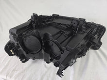 Load image into Gallery viewer, Genuine OEM Adaptive LED headlight for BMW iX3 and compatible models including G08, G01, F97, G02, and F98 with LCI (facelift) updates. This right-side headlamp, part number 5A29204, features adaptive lighting technology for enhanced road illumination and driving safety. The image showcases the original right LED headlight in used condition, clearly showing the lens, housing, and connector points — perfect for replacement on BMW iX3 and related LCI models.