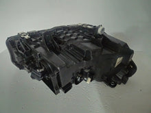 Load image into Gallery viewer, This image shows the left-side ICON Adaptive LED headlight for BMW models iX3 G08, X3 G01, X3 M F97, X4 G02, and X4 M F98, featuring OEM genuine quality with part number 7466119. This used original headlamp is designed to deliver BMW’s signature Adaptive LED lighting with ICON styling, ensuring precise fitment, enhanced visibility, and modern aesthetics for these high-performance models.