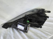 Load image into Gallery viewer, This image shows the right-side Xenon headlight for the Maserati Ghibli models from 2014 to 2017, featuring OEM genuine quality with part number 00670004658. This used original headlamp is designed for perfect fitment, delivering powerful Xenon lighting and the signature sleek styling expected from Maserati’s luxury performance vehicles