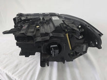 Load image into Gallery viewer, Used genuine BMW Adaptive LED headlight for X1 F48 LCI (facelift) model. This right-side OEM headlamp, part number 5A01178, is equipped with adaptive lighting technology for improved night visibility and cornering performance. The image displays the original right Adaptive LED headlight in used condition, showing the clear lens, mounting brackets, and electrical connectors — an ideal OEM replacement for BMW X1 F48 LCI vehicles.

